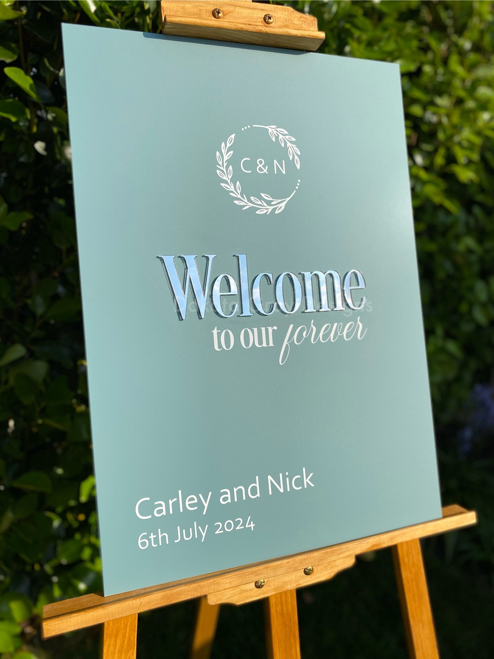 Bespoke monogram wedding welcome board